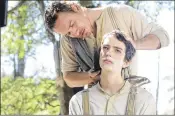  ?? CONTRIBUTE­D BY A24 FILMS ?? Michael Fassbender and Kodi Smit-McPhee star in “Slow West.”