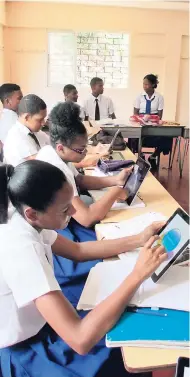  ??  ?? St Vincent Strambi students use technology in the learning process.