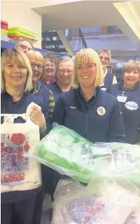  ??  ?? Tesco staff recently donated 1,000 carrier bags to the Rochdale Foodbank