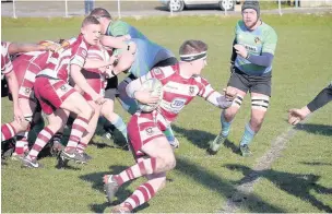  ?? Tim Taylor ?? Action from Rochdale’s thrilling game against Burnage