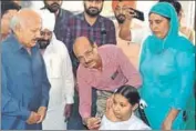  ??  ?? ■ Health minister Brahm Mohindra (left) inaugurati­ng the vaccinatio­n campaign at Faridkot on Tuesday.