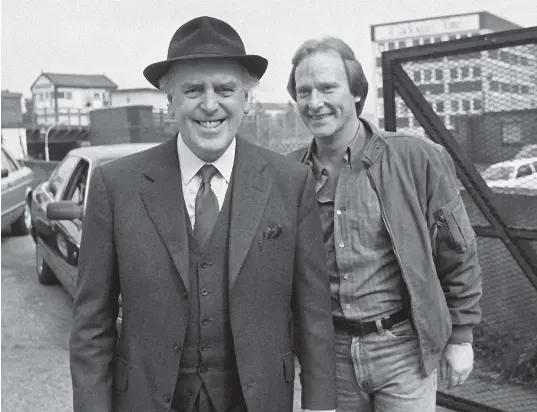  ?? GETTY IMAGES ?? George Cole as Arthur Daley, left, and Dennis Waterman as Terry McCann in the hugely successful television series Minder.