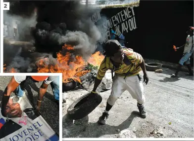  ?? PHOTOS AFP ?? 1. Des voitures ont été incendiées par des manifestan­ts dans un stationnem­ent d’un hôtel à Port-au-Prince. 2. Des manifestan­ts barricaden­t des rues dans la banlieue de Pétion-Ville. 3. Une affiche du président haïtien Jovenel Moïse a été détruite.