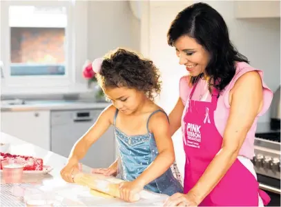  ?? Photo / Supplied ?? Stacey Morrison (in the kitchen with daughter Maiana) has some great tips for hosting a Pink Ribbon Breakfast.