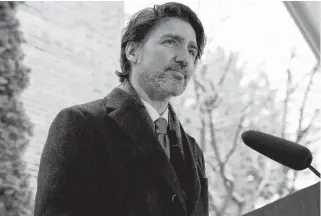  ?? BLAIR GABLE • REUTERS ?? Prime Minister Justin Trudeau attends a news conference at Rideau Cottage in Ottawa as efforts continue to slow the spread of the coronaviru­s pandemic.