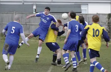  ??  ?? Goalmouth action from the Ashford Rovers ‘B’ versus Glencormac United Charlie O’Leary Cup tie.