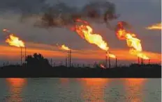  ?? Reuters ?? ■ Gas is flared at oilfields in Basra, southeast of Baghdad. Brent crude prices have risen 4 per cent this year.