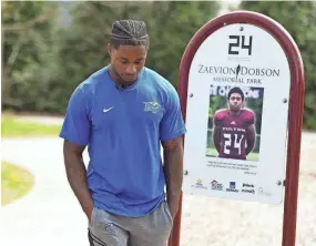  ?? SAUL YOUNG/NEWS SENTINEL ?? Former Middle Tennessee State football player Zack Dobson stops at the park named in honor of his brother, Zaevion Dobson, on March 25 in Knoxville, Tenn.