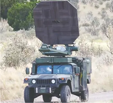  ?? HANDOUT / AFP / GETTY IMAGES ?? The active denial system (ADS) emits a beam of energy that will make the target feel a strong burning sensation on their skin without causing genuine injury. It can project the rays 500 metres, giving it a much greater range than
such crowd-control devices as rubber bullets or water cannons.