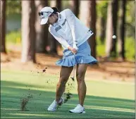  ?? Chris Carlson / Associated Press ?? Jin Young Ko, of South Korea, hits from the fairway on the 10th hole during the first round of the U.S. Women’s Open at the Pine Needles Lodge & Golf Club in Southern Pines, N.C. on Thursday.