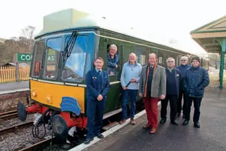  ?? ?? Right: Pete Frost (left) and Bob Richards (third from left) with a group of some of the last BR train passengers at Corfe Castle on Saturday, January 1, 2022. ANDREW PM WRIGHT