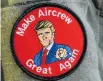  ?? Photos / New York Times ?? Donald Trump had his supporters in Yokosuka, many of whom wore patches on their flight suits that featured a likeness of Trump and the words Make Aircrew Great Again, a play on Trump’s campaign slogan.