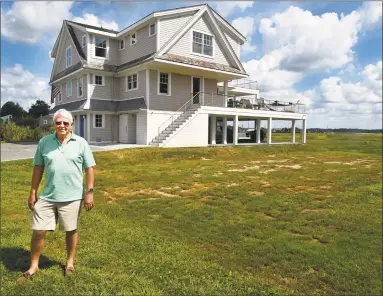  ?? Peter Hvizdak / Hearst Connecticu­t Media ?? Gary Nuttall, of Seaside Avenue in Guilford, has a house designed to deal with storm surge and rising sea levels.