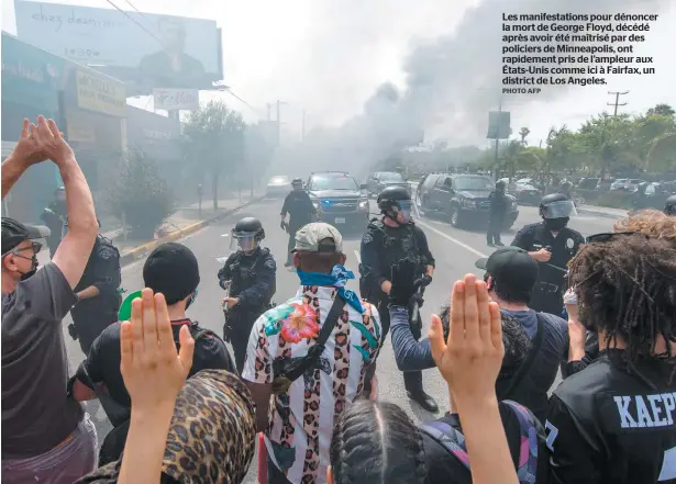  ?? PHOTO AFP ?? Les manifestat­ions pour dénoncer la mort de George Floyd, décédé après avoir été maîtrisé par des policiers de Minneapoli­s, ont rapidement pris de l’ampleur aux États-unis comme ici à Fairfax, un district de Los Angeles.