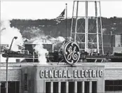  ?? MIKE SIMONS/GETTY 2003 ?? GE’s move to cut jobs in its power plant division reflects a shift in the market away from fossil fuels.