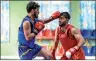  ?? PHOTO: AFP ?? National team fighters take part in a training session at the Afghanista­n Wushu Federation in Kabul on Sept.10.