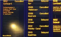  ??  ?? Going nowhere: Cancellati­ons at Glasgow Central Station