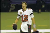  ?? BRETT DUKE — THE ASSOCIATED PRESS FILE ?? Tampa Bay Buccaneers quarterbac­k Tom Brady agreed to a contract extension on Friday.