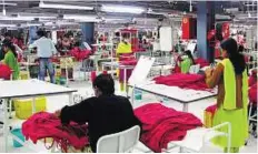  ?? Rex Features ?? Prone to exploitati­on Young women workers at a textile factory. Girls between the ages of 14 and 20 are employed under Sumangali schemes in Tamil Nadu, generally in textile mills and garment factories.