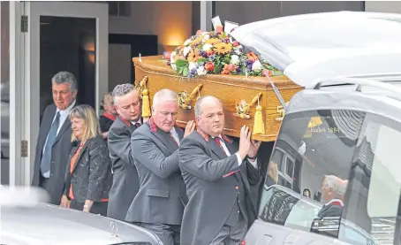  ?? Pictures: Jason Hedges. ?? Pall-bearers with Liam’s coffin. In the background is Tricia Colgan, his mother.