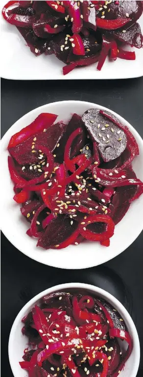  ??  ?? Beets and onion in ume vinegar dressing is a delightful­ly colourful dish.