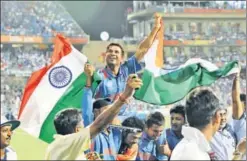  ?? SANTOSH HARHARE/ HINDUSTAN TIMES ?? Sachin Tendulkar carried by team members as India wins the Cricket World Cup final in Mumbai on April 2, 2011.