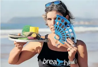  ?? | SHELLEY KJONSTAD African News Agency (ANA) ?? SWIMMING legend Sarah Ferguson, who is organising a public open ocean swim early next month in aid of marine conservati­on, shows some of the plastic she picked up off the beach in just 30 seconds.