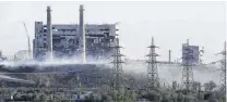  ?? PHOTO: REUTERS ?? Smoking ruins . . . A damaged facility of the Azovstal Iron and Steel Works gives off smoke during the UkraineRus­sia conflict in the southern port city of Mariupol.