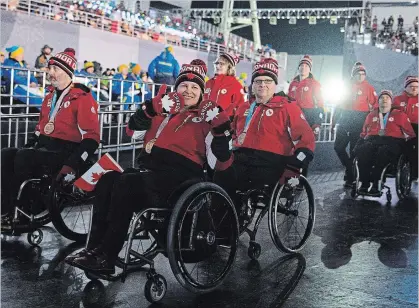  ?? JOEL MARKLUND THE ASSOCIATED PRESS ?? Team Canada enters the stadium during the Paralympic­s closing ceremony on Sunday.