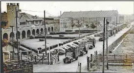  ??  ?? Newly uploaded photos from The Oklahoman Archives Collection include this 1943 image of the stockyards by newspaper photograph­er C.J. Kahlo.