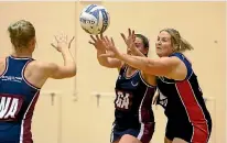  ?? PHOTO: MYTCHALL BRANSGROVE/FAIRFAX NZ ?? Rio Olympics shooting silver medallist Natalie Rooney, right, in action for Harlequins in club netball in Timaru.