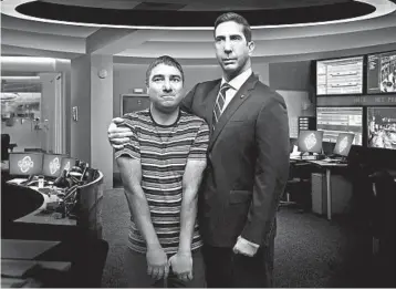  ?? PEACOCK PHOTOS ?? Nick Mohammed, left, and David Schwimmer in the series “Intelligen­ce,” on the new streaming service Peacock.