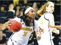  ?? STAFF PHOTO BY C.B. SCHMELTER ?? UTC forward Eboni Williams (3), shown during Thursday’s game against Western Carolina, scored 22 points on Saturday.