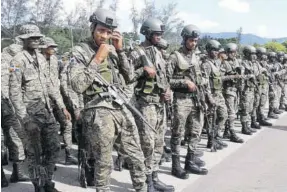  ?? (Photo: CMC) ?? Dominican Republic soldiers on the border with Haiti, yesterday.