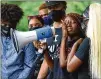  ?? STEVE SCHAEFER / FOR THE AJC ?? Audrey Grice becomes emotional while relaying a personal story during Teens Looking For Change rally at Piedmont Park on Thursday.
