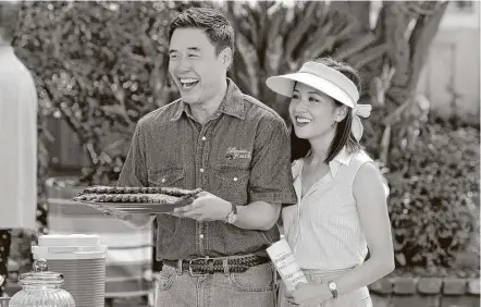  ?? ABC ?? Randall Park and Constance Wu star in the comedy series “Fresh Off the Boat.” A new study finds that Asian-American characters are slighted on TV programs despite progress over the past decade.