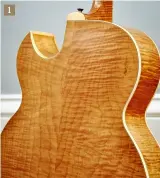  ??  ?? 1 1. The two-piece solid carved back is crafted from a high-grade figured maple that was typically selected for Super 400s