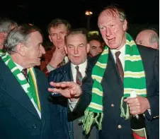  ??  ?? T Charlton with Taoiseach Albert Reynolds in 1993 after the World Cup qualifier in Belfast