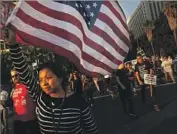  ?? Genaro Molina Los Angeles Times ?? MARCHERS in L.A. protest President Trump’s decision to end protection­s for young immigrants.