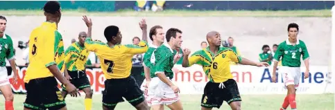  ?? FILE PHOTOS ?? In this file photo from November 16, 1997, Jamaica’s Reggae Boyz battled with Mexico to a 0-0 draw at the National Stadium in Kingston. The result meant the Reggae Boyz qualified for the 1998 FIFA World Cup in France.