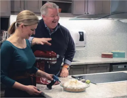  ?? MIKE PEARSON HAMILTON COMMUNITY NEWS ?? Anna Olson and her husband, Michael, share a laugh during an interactiv­e baking demonstrat­ion at Seasons Stoney Creek on Jan. 23.