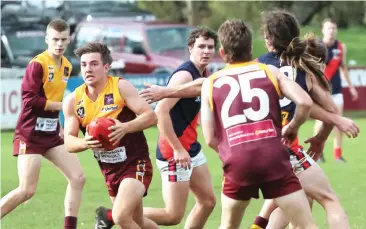  ??  ?? Jake Simpson, breaking clear with the ball for Drouin against Bairnsdale on Saturday, is among the youngsters in the side building some winning experience, with a couple of others - Harry Wans (25) and Fletcher Robertson-Edgar - also figuring in this passage of play.