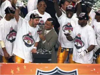  ??  ?? Picking up the MVP award in the Tennessee win (Getty)