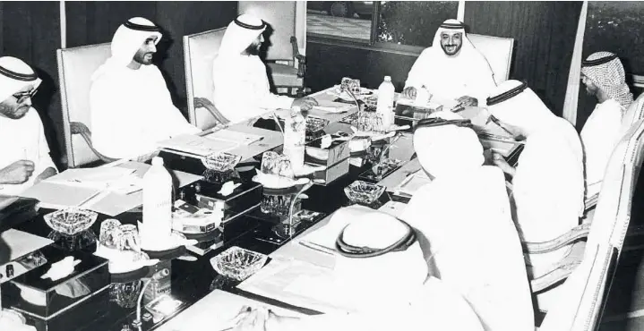  ?? Gulf News Archives ?? Helm of affairs
Shaikh Khalifa chairs a meeting of the Abu Dhabi Executive Council in 1975. It was in February 1974 that Shaikh Khalifa became the first chairman of the Abu Dhabi Executive Council, which replaced the Cabinet of the emirate.