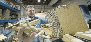  ?? MARK VAN MANEN ?? University of B.C. researcher Felix Bock and his team have come up with a way to turn wood waste into industrial­grade particlebo­ard. Metro Vancouver supported the research because it’s a way to recycle all that wood from demolition­s across the region....