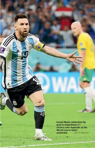  ?? GETTY IMAGES ?? Lionel Messi celebrates his goal in Argentina’s 2-1 victory over Australia at the World Cup in Qatar yesterday.