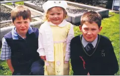  ?? ?? Padraig Pratt, Barry’s Boreen, Fermoy (right) who received his Confirmati­on in Fermoy in April 2001, seen here with brother Ian and sister Rachel in the grounds of St Patrick’s Church, Fermoy.