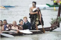  ??  ?? Britain’s Prince Harry (second from right) took a canoe ride along the Whanganui river, the third longest in New Zealand, in May 2015.