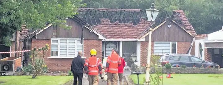  ??  ?? ●●The fire investigat­ion underway at Ladybarn Crescent in Bramhall