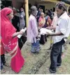  ?? PHOTO: REUTERS FILES ?? Villagers queue to have their documents verified by government officials, in the northeaste­rn state of Assam, India, this month.